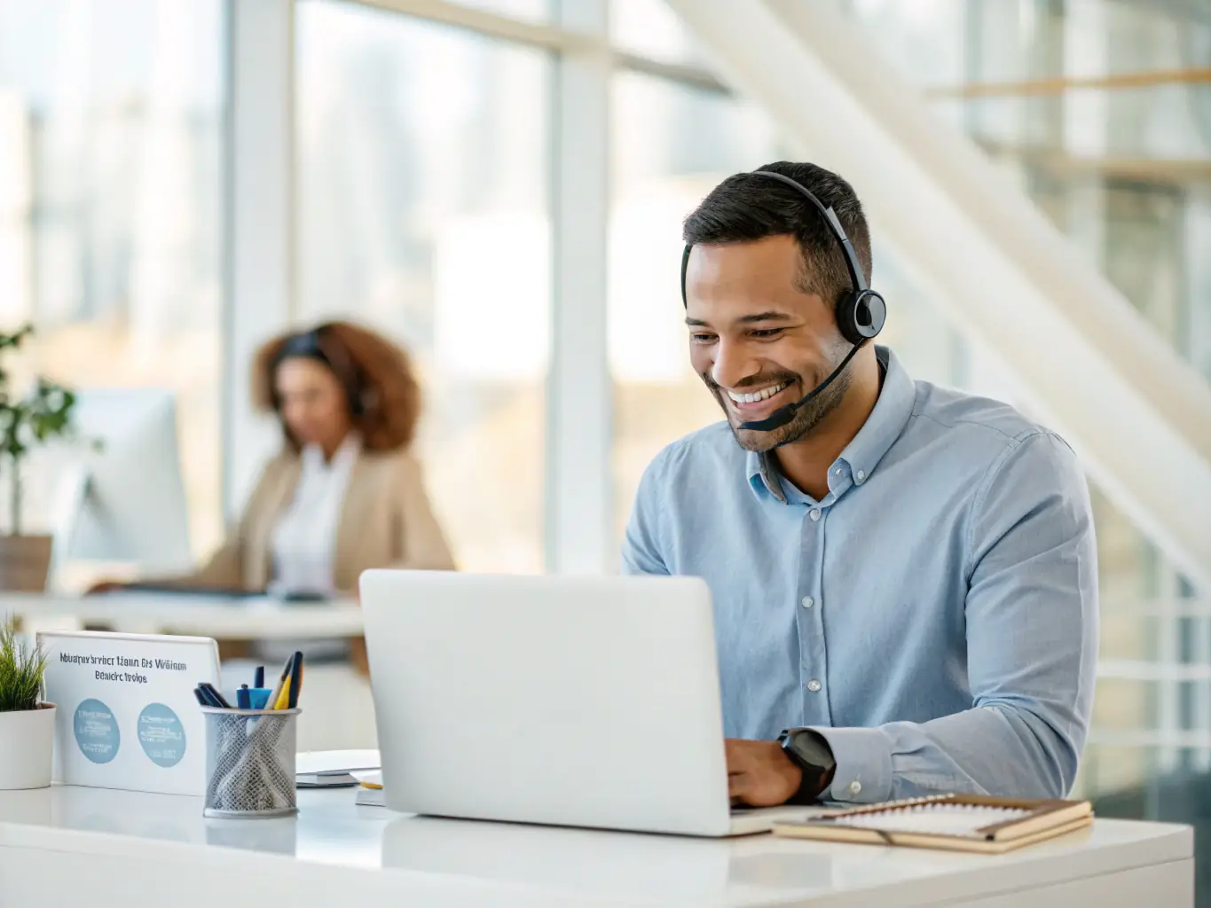 A DataTel 360 support team member providing remote assistance to a client, highlighting the ongoing support and maintenance services.