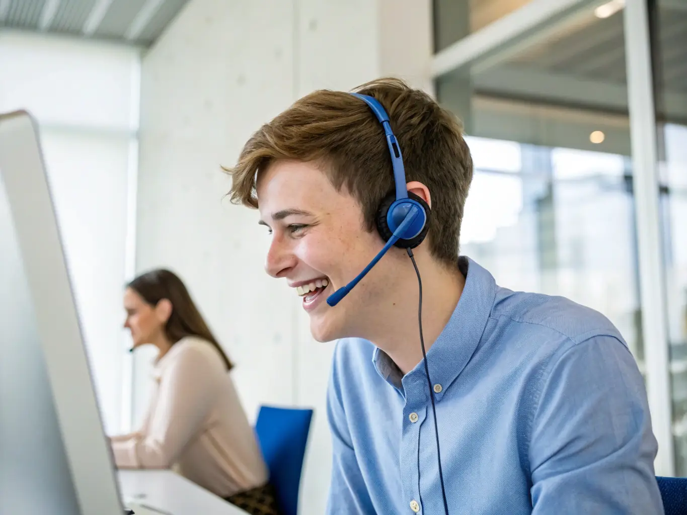 A friendly support agent assisting a customer over the phone, emphasizing the North America-based support.