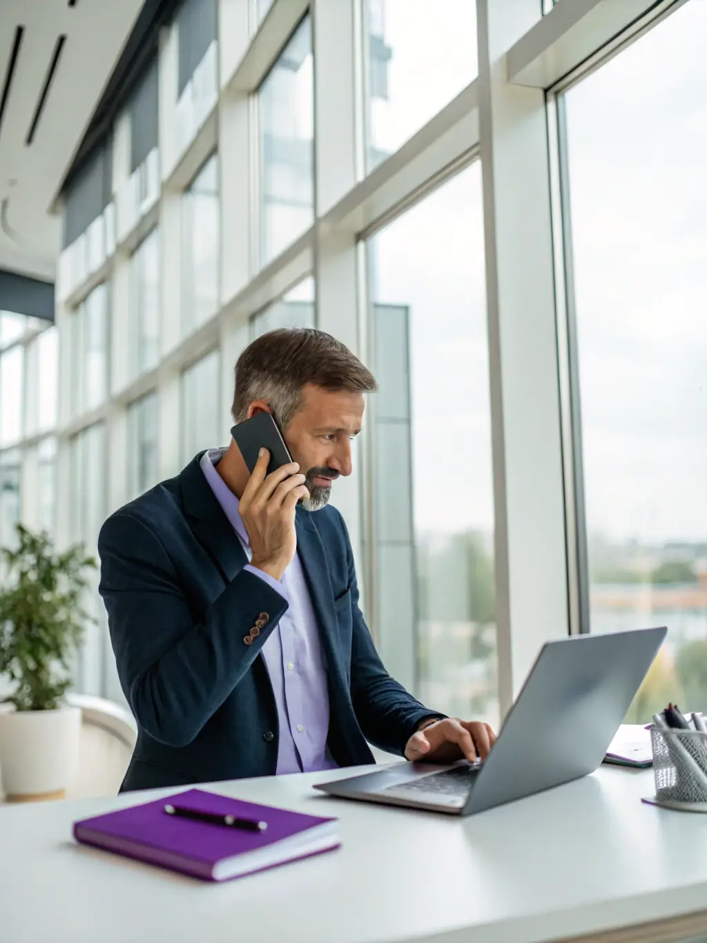 A user seamlessly switching between their desk phone and mobile app during a call, demonstrating the device switching feature.