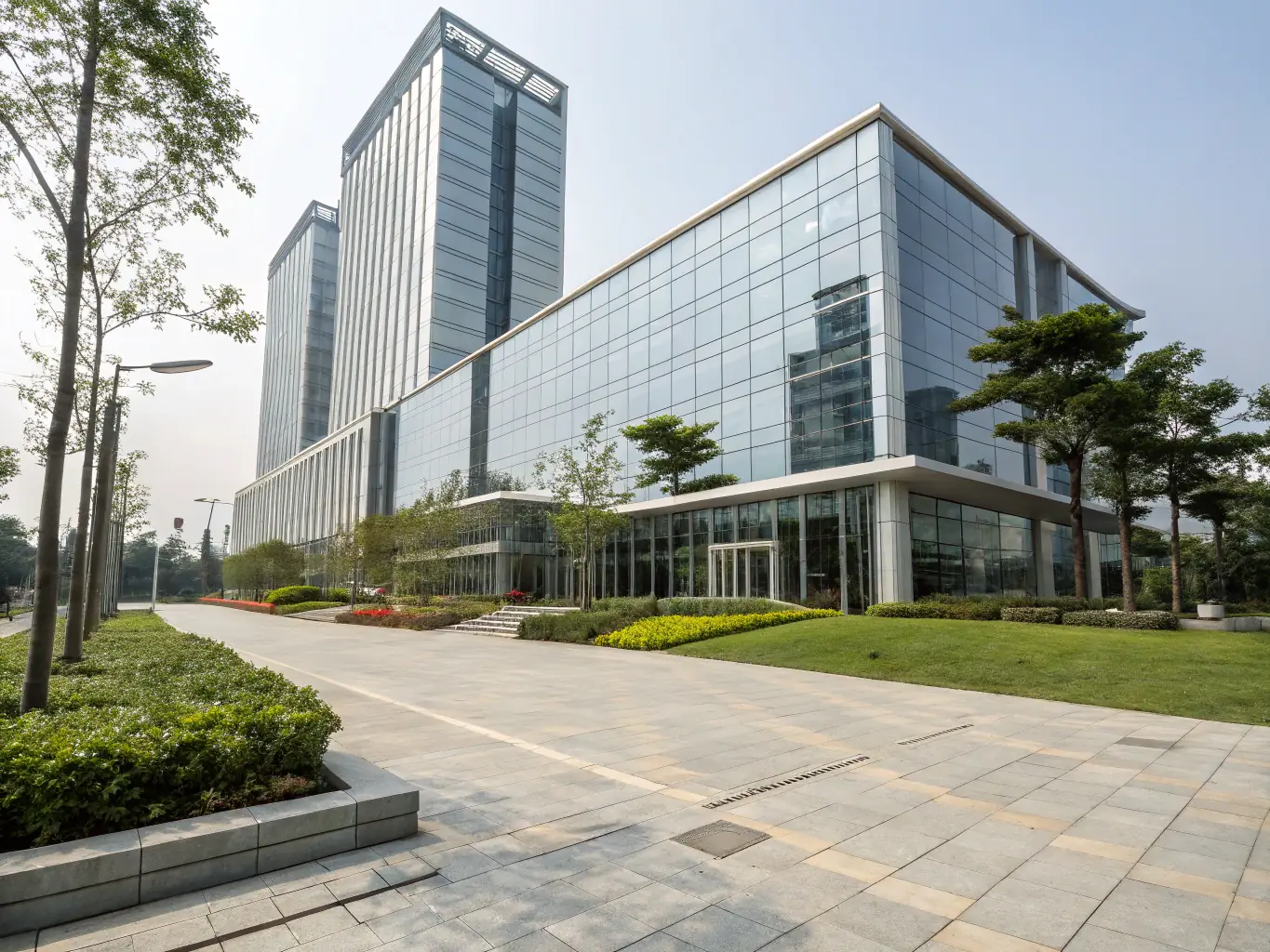 A photo of a modern office building with fiber optic cables running into it, symbolizing the scalability and future-proof nature of fiber optic infrastructure.
